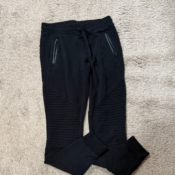 Alo Yoga Urban Moto sweatpants featuring ribbe panels and zippered pockets - Picture 2 of 5